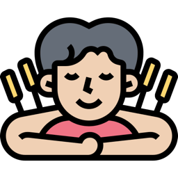 Person lying prone and relaxed with yellow-handled needles in the upper back